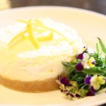 frozen lemon souffle and flowers on plate