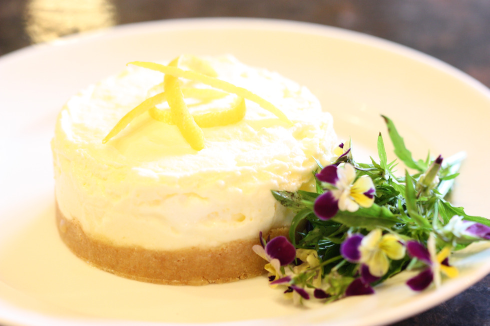 frozen lemon souffle and flowers on plate