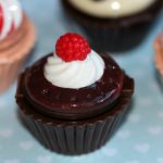 cupcake lip gloss with raspberry on top