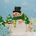 snowman in forest decorated cookies